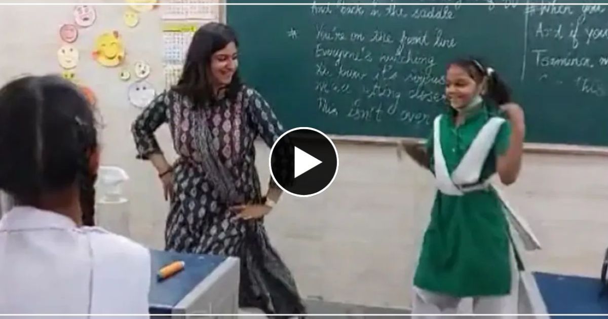 While teaching, madam remembered the English song, started singing desi dance with the children in the class.