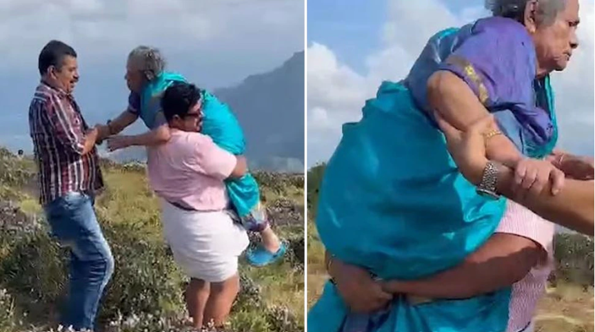 Two sons made their mother's dream come true by sitting on their shoulders